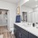 bathroom with a large mirror