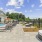 swimming pool in a courtyard with umbrellas