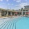 swimming pool with a building in the background