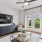 living room with glass doors and a coffee table and tv