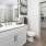 a bathroom with a tub toilet and sink